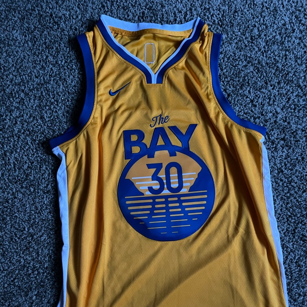 Steph Curry basketball jersey.
